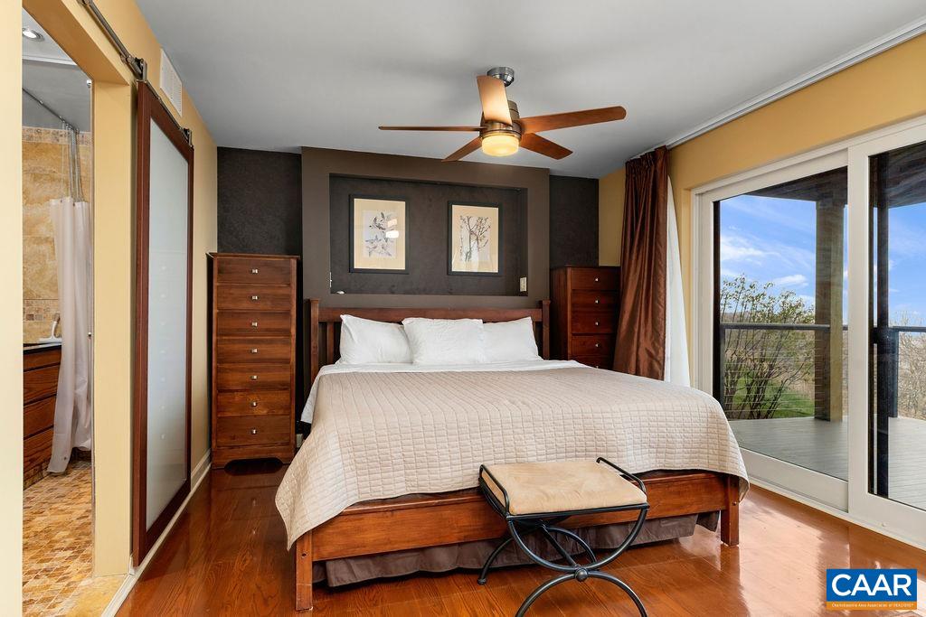 The lower level features a large second master suite with its own wood burning firepalce.