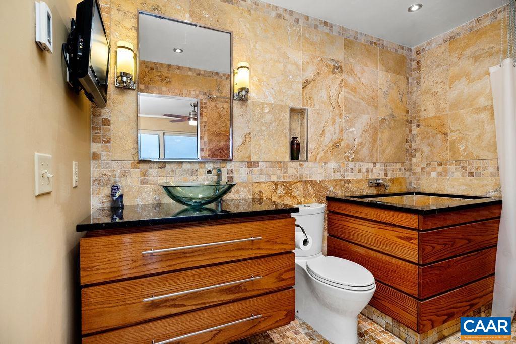 Stunning bathroom off of the second master suite downstairs.