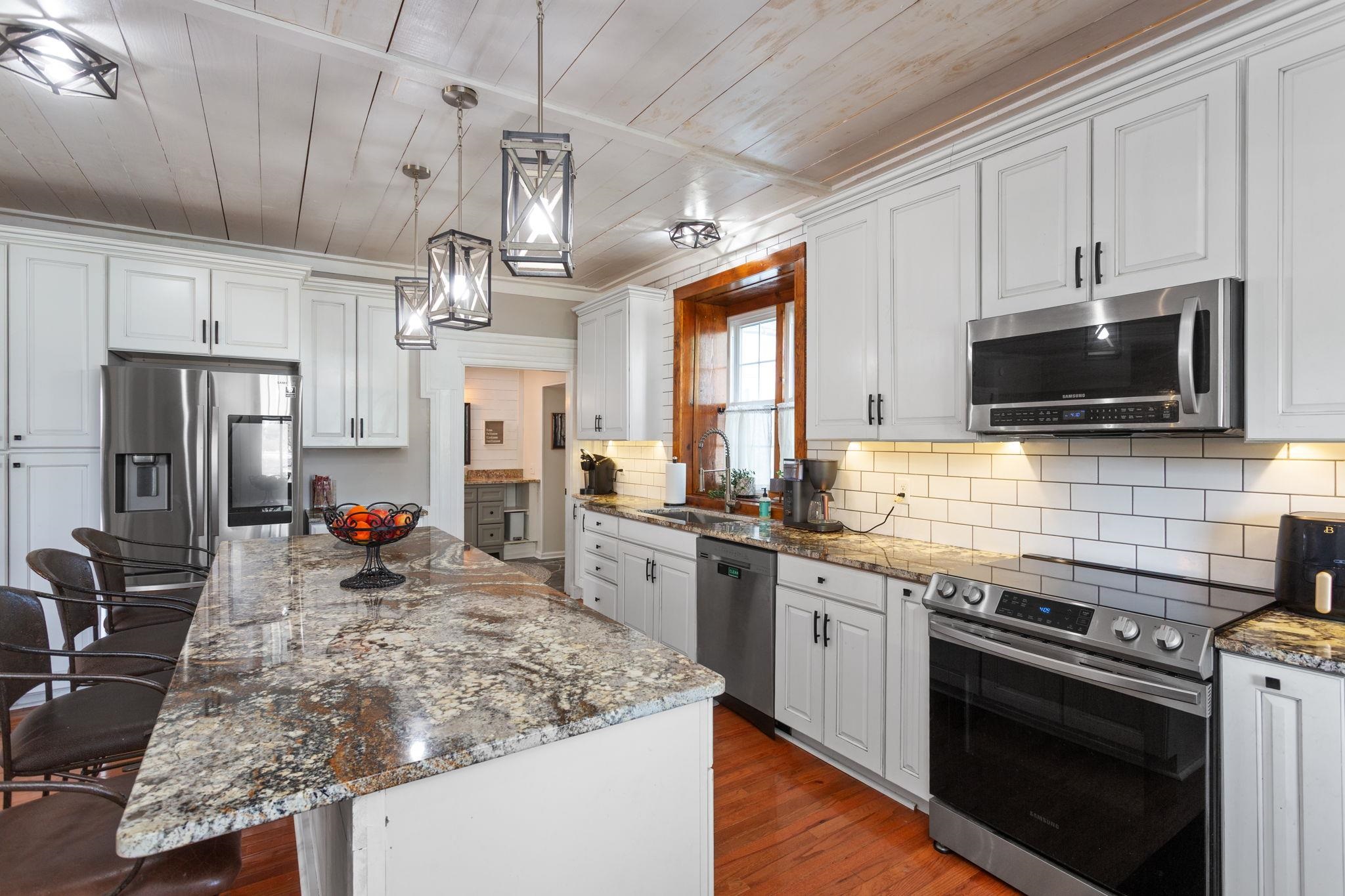 Lots of counter space for prepping meals and cabinets for storage.