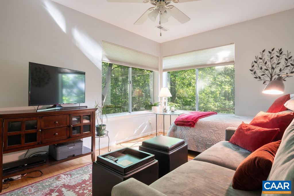 2nd bedroom/family room with windows looking into treetops. beautiful