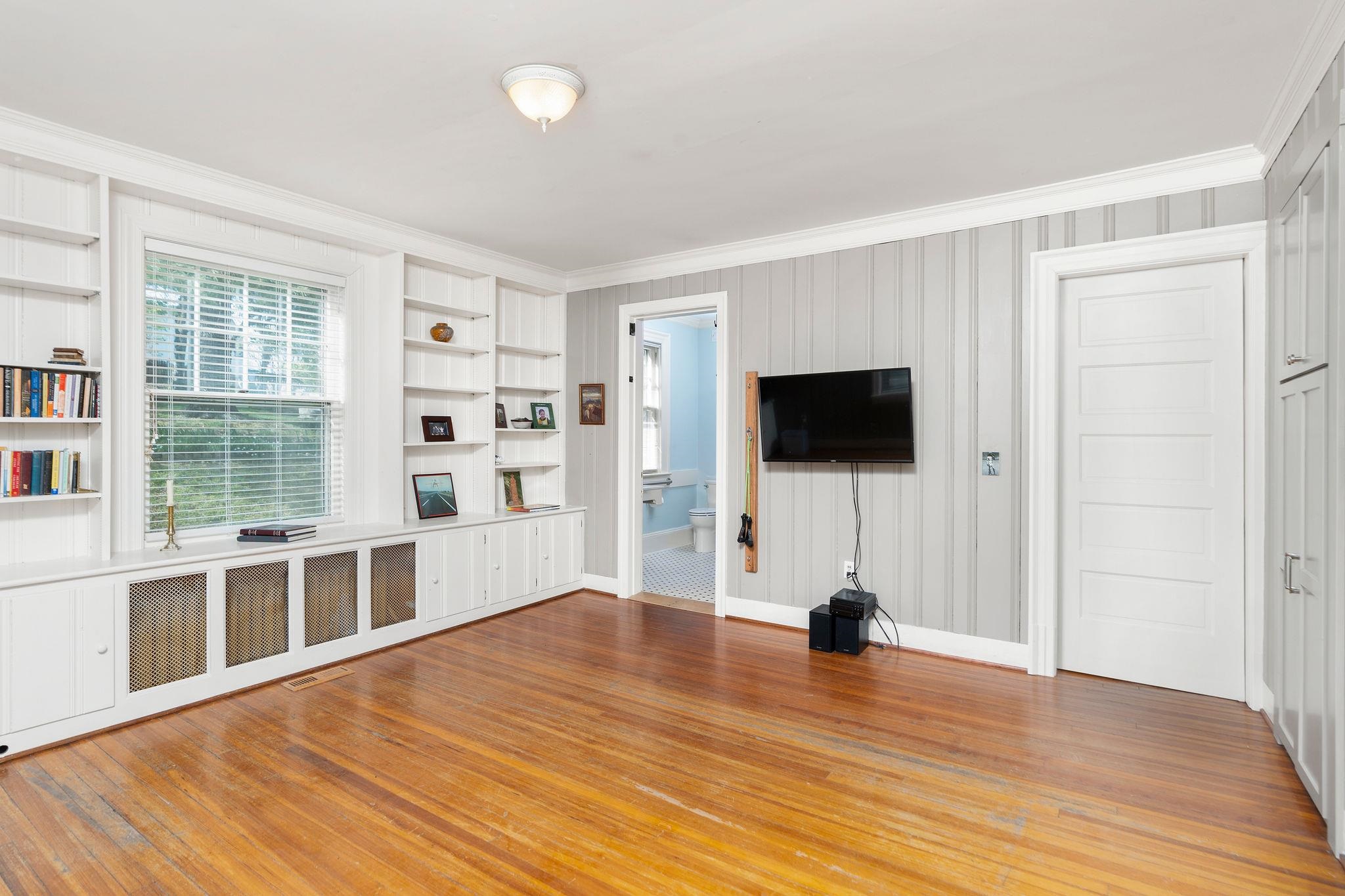 This could serve as a study, library or as a main floor bedroom.  There is a private bath attached which has zero entry shower.