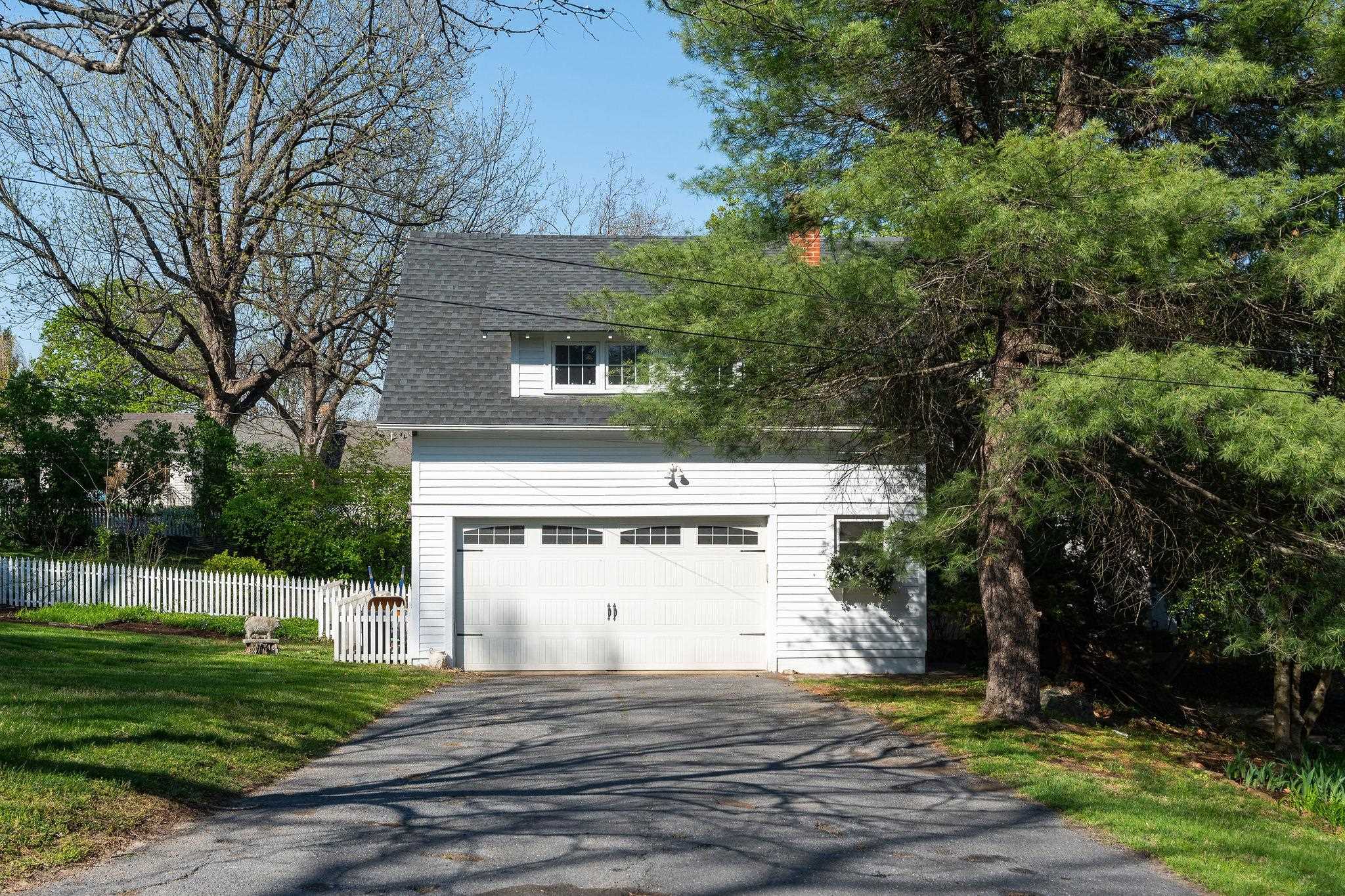 The detached garage has a great space above perfect for an office, a man cave, get togethers, teens, you name it.  It's heated/cooled w/a mini split, has beautiful hardwood floors, and a kitchenette.