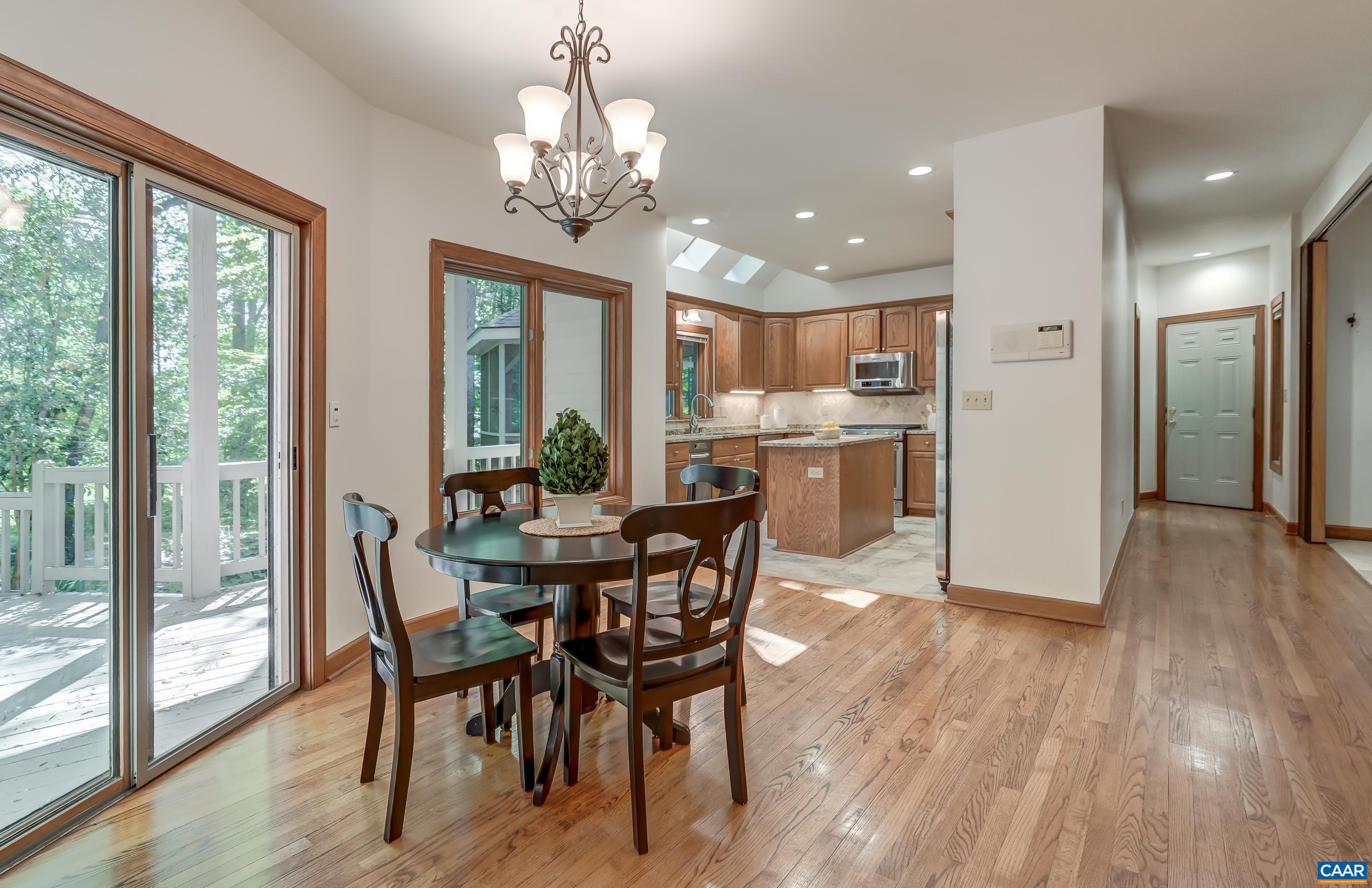 Breakfast nook with sliding doors to deck.