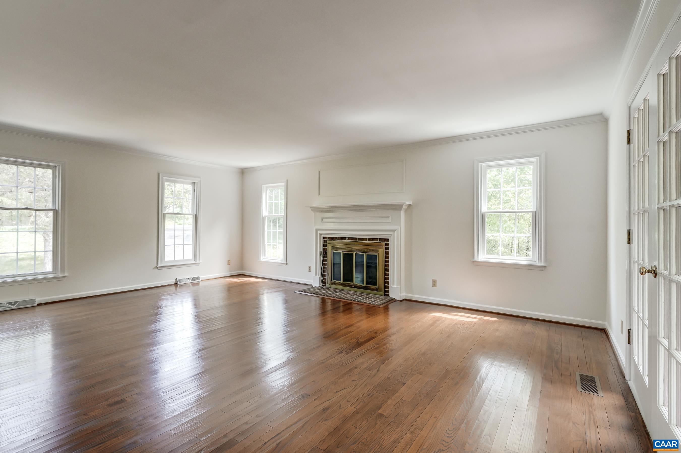 French doors lead to secluded screened porch.