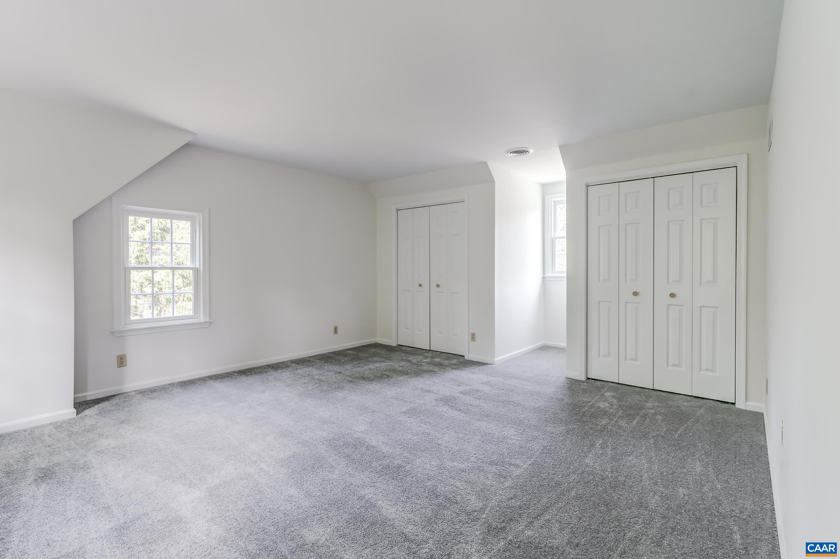 Large bedroom upstairs.