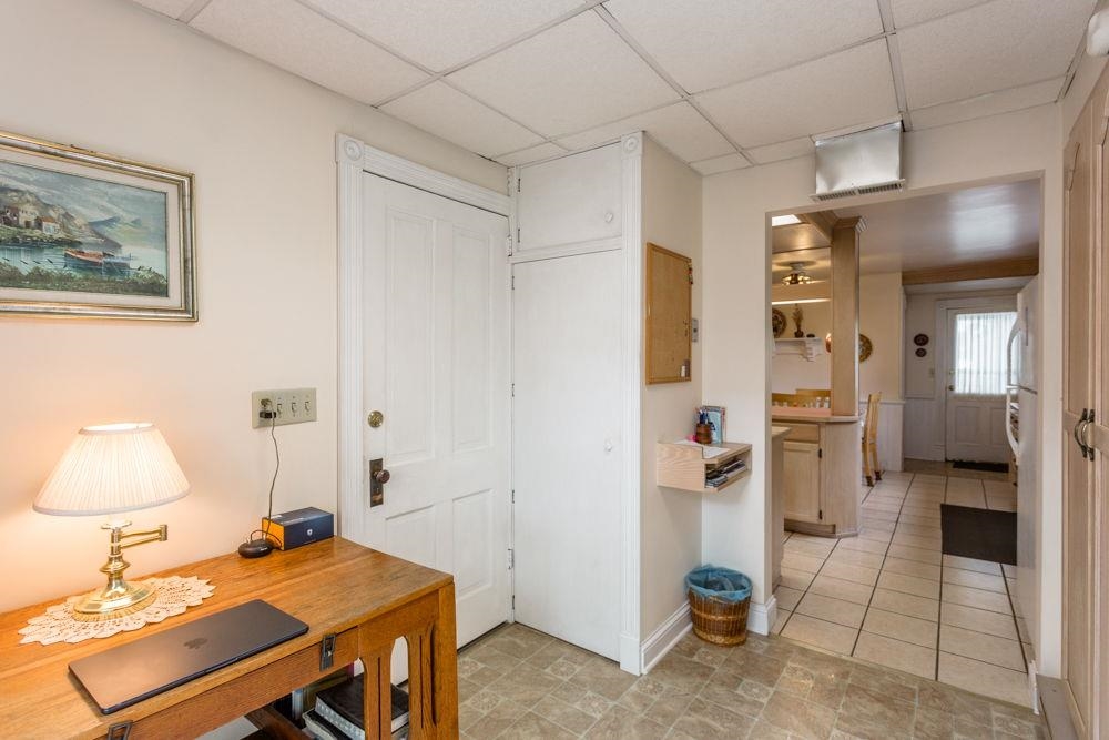 off the kitchen which leads to the laundry/half bath.