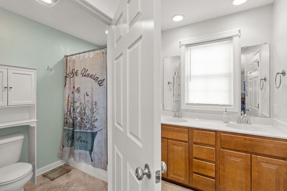 Private area for privy and walk-in shower.