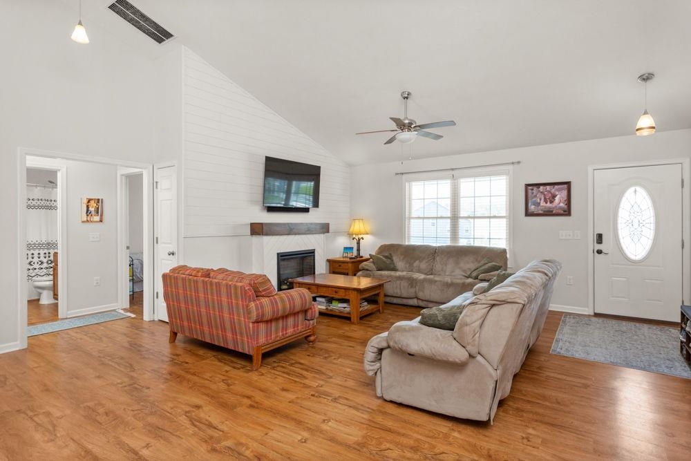 off the kitchen/dining area with gas fireplace.