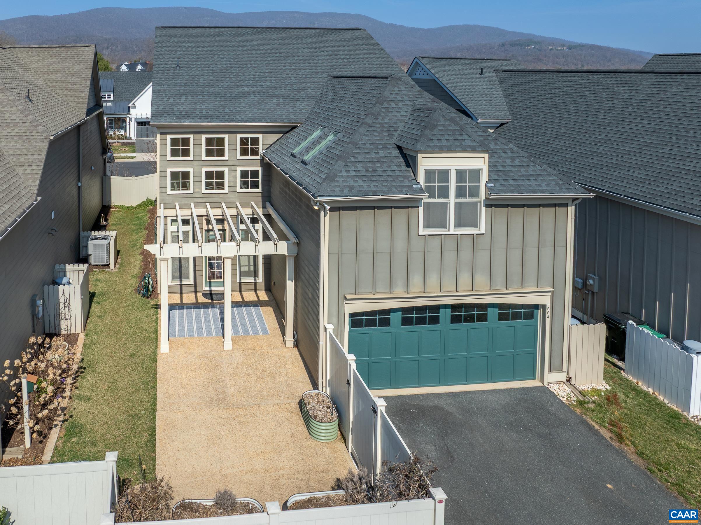 Privacy fencing and large patio with pergola.