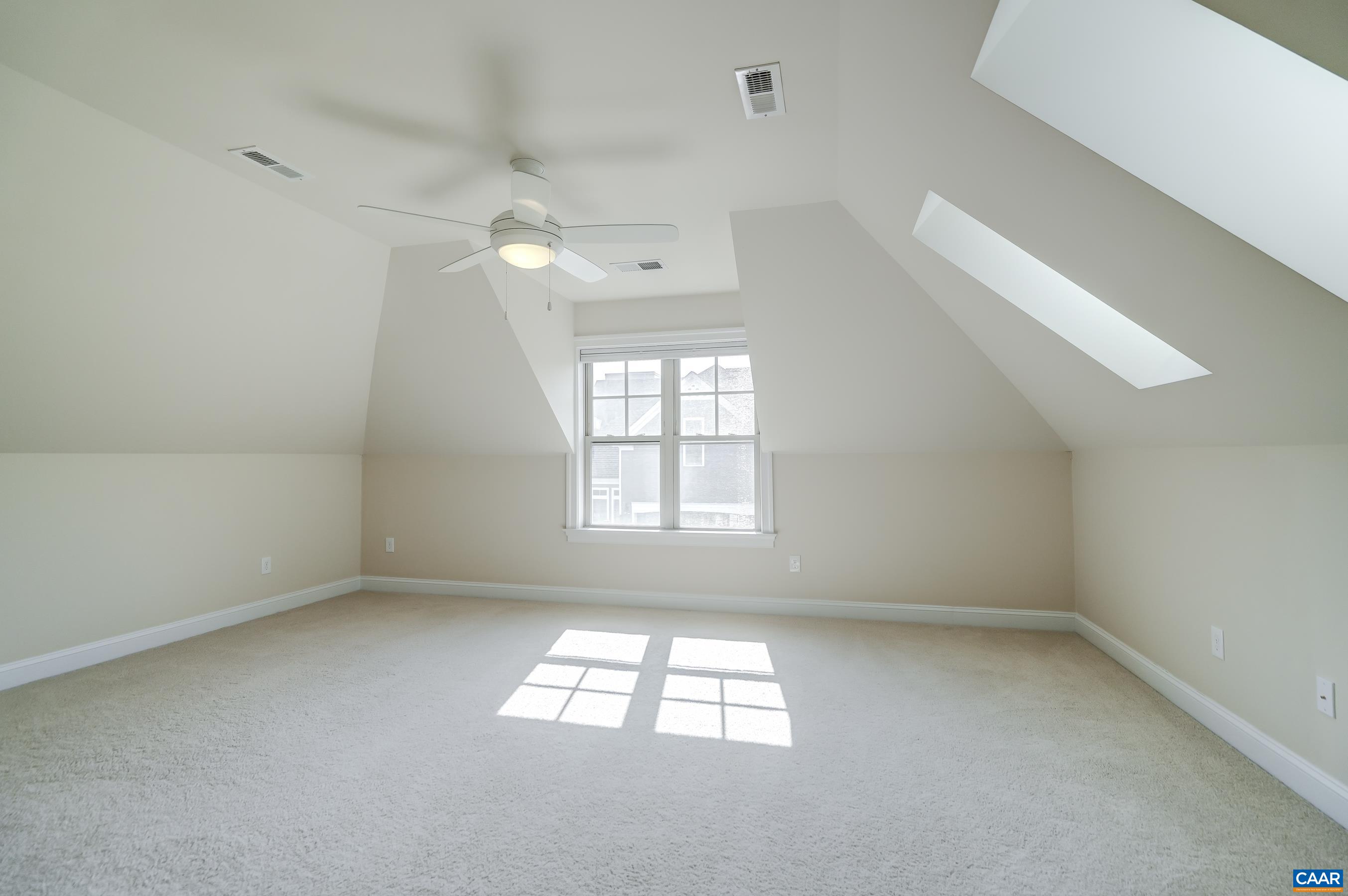 Large bonus room could be a fourth bedroom, workout space or rec room.