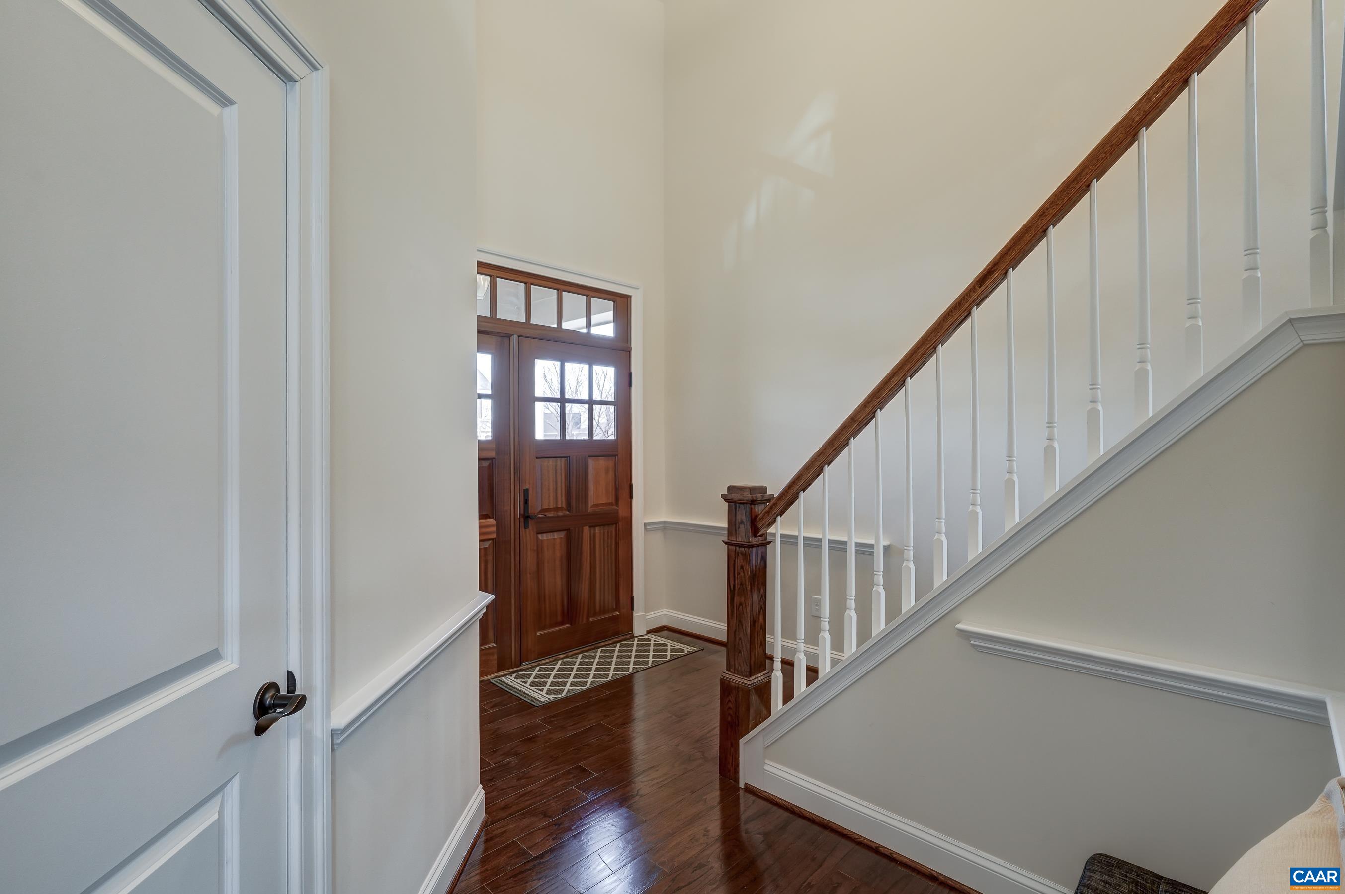 Hardwood flooring throughout the main living spaces sparkle in this light-filled home.