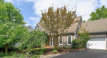 to this spacious charming Cape Cod in popular Western Ridge