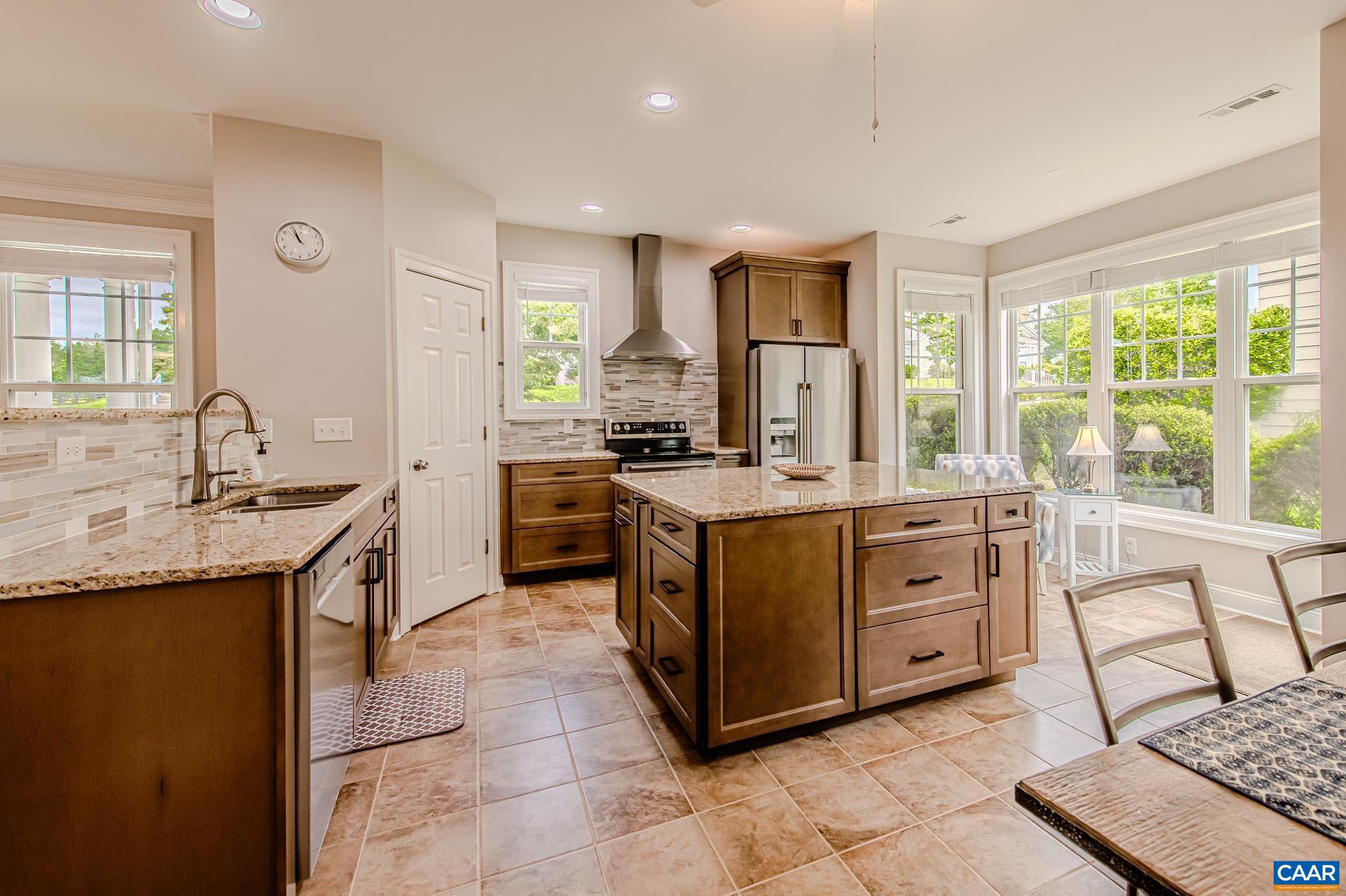 Tile floors & back splash, garnet counters plus ALL new appliances.
