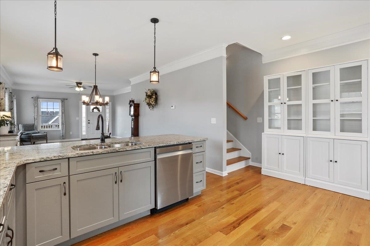 Note the two white Ikea display cabinets convey with home.  The stairs lead to 2nd floor.