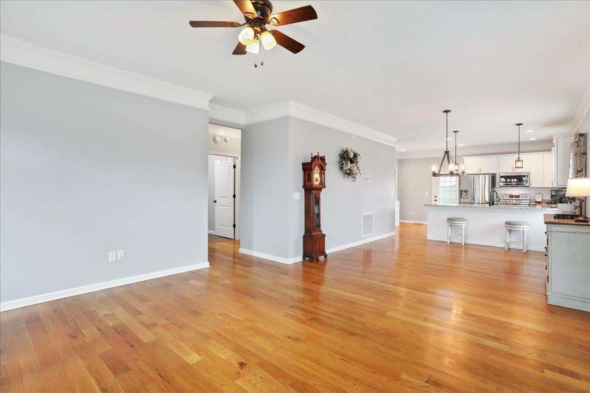 The opening by the clock is where you enter to the Primary Ensuite.