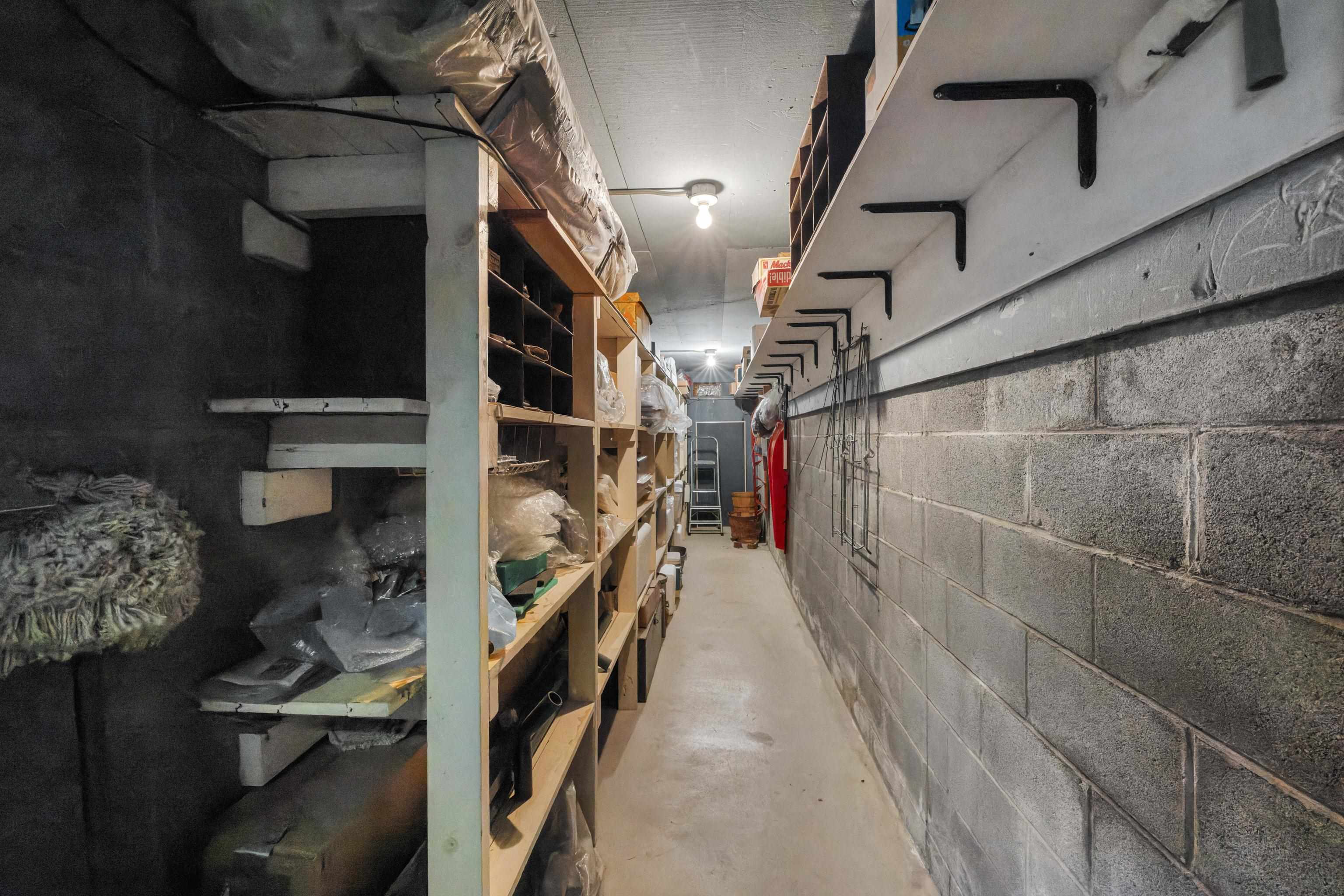 *Unfinished basement under front porch.