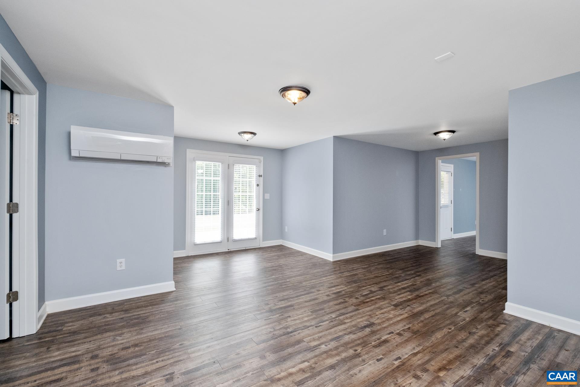 Recently updated basement includes flex space that can be used as a living room/gathering area. Double doors go to the ground level, custom tile patio.  Great for entertaining!