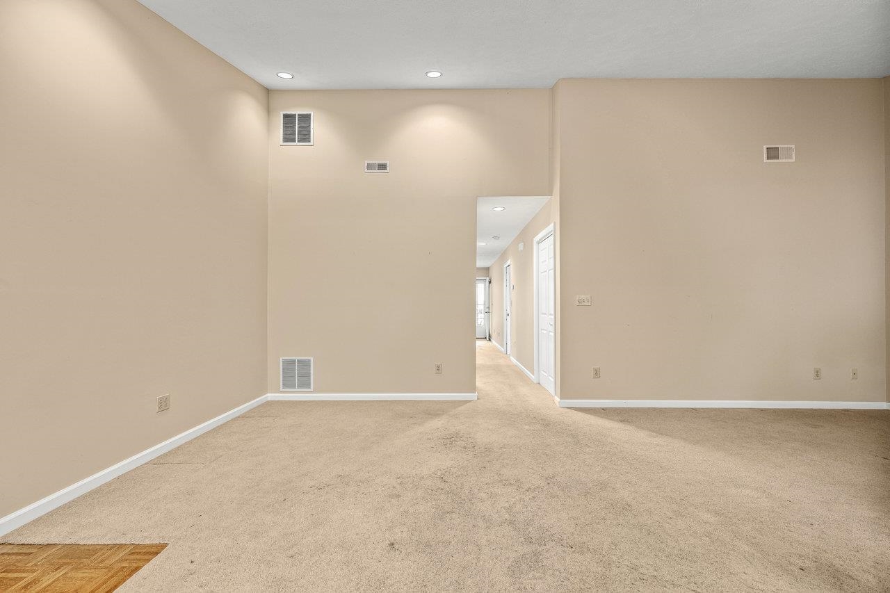 To the left is the LAUNDRY ROOM and FULL BATH, straight ahead is the Den, and screen porch