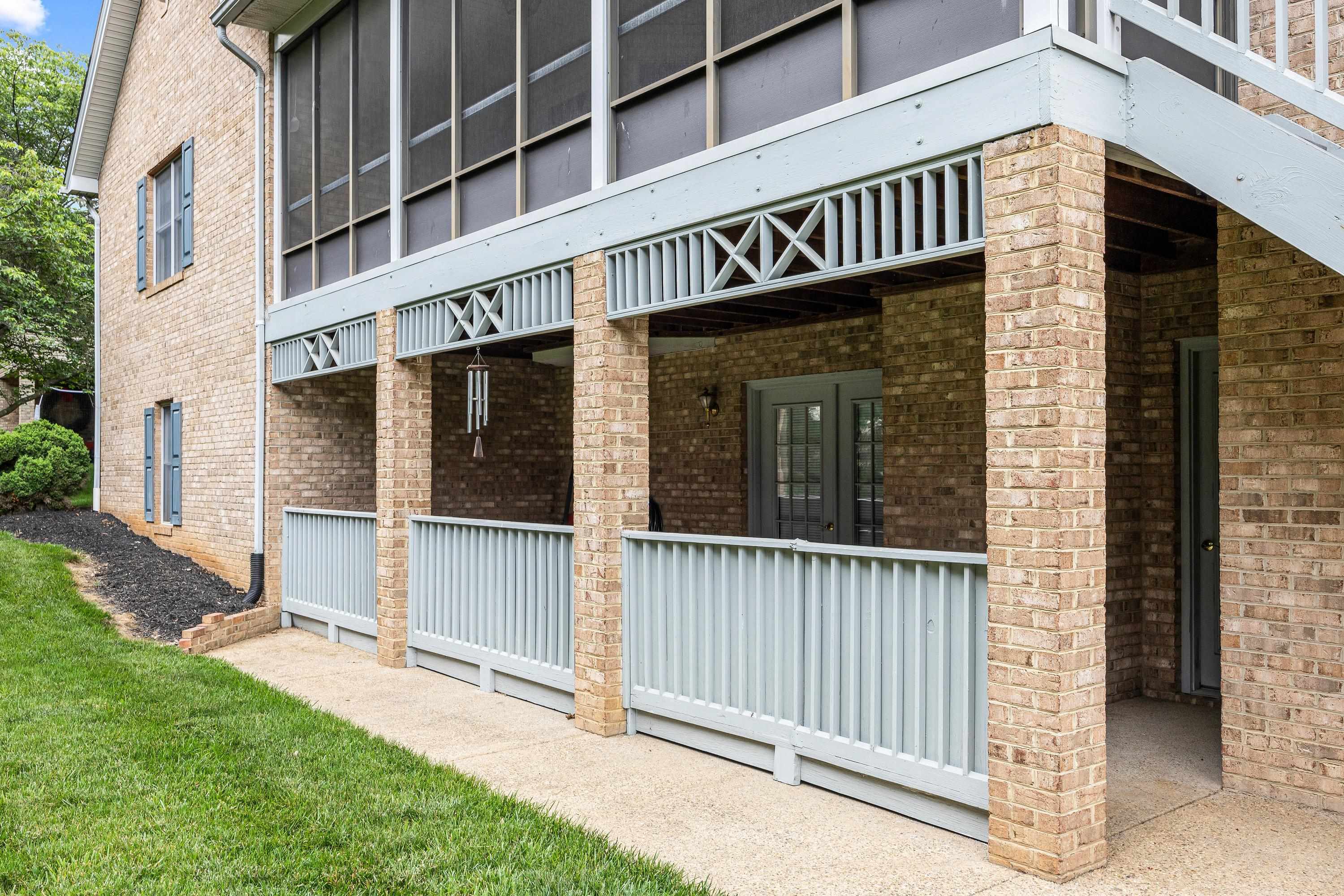The lower level offers a concrete patio off of the basement space.  This patio offers storage/entertainment options for the backyard.