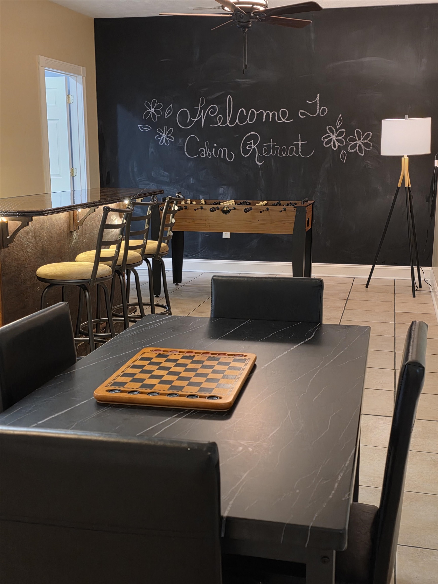 From the custom penny counter top to the foosball, this room offers a lot of fu