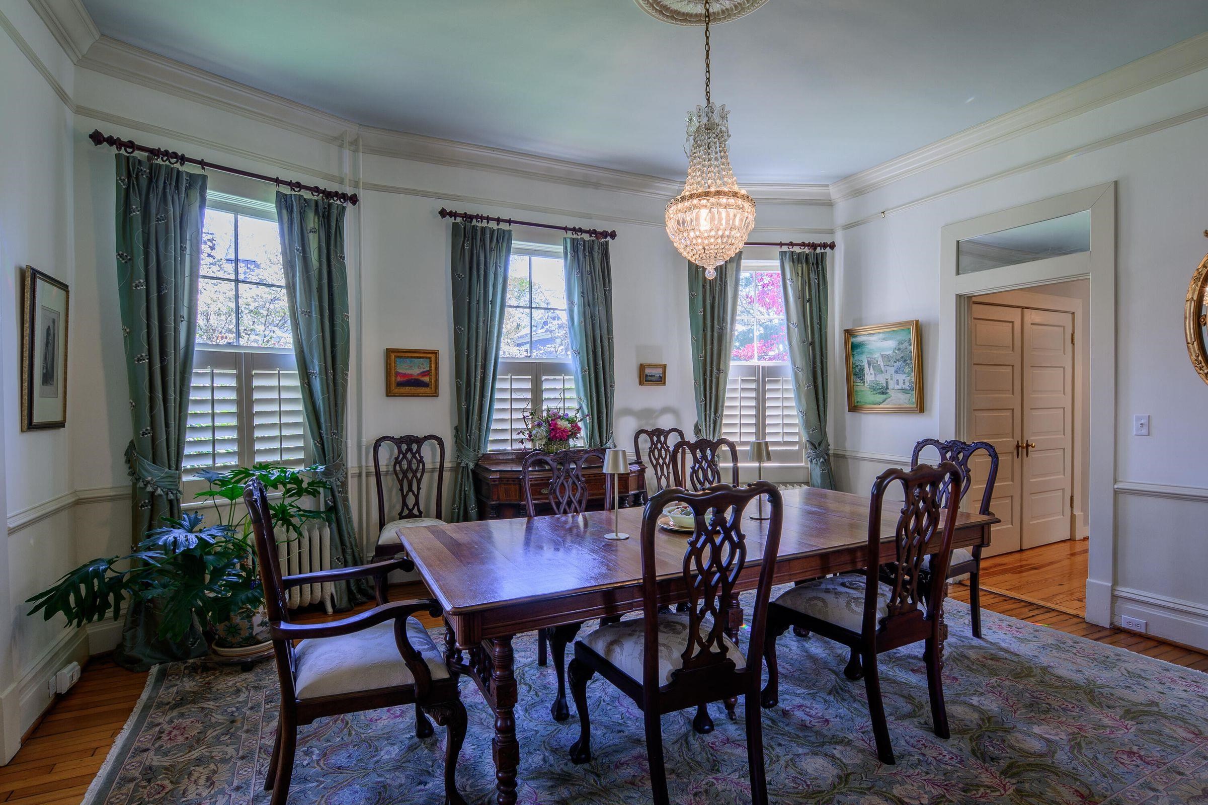 The living room flows into the impeccably maintained dining room.