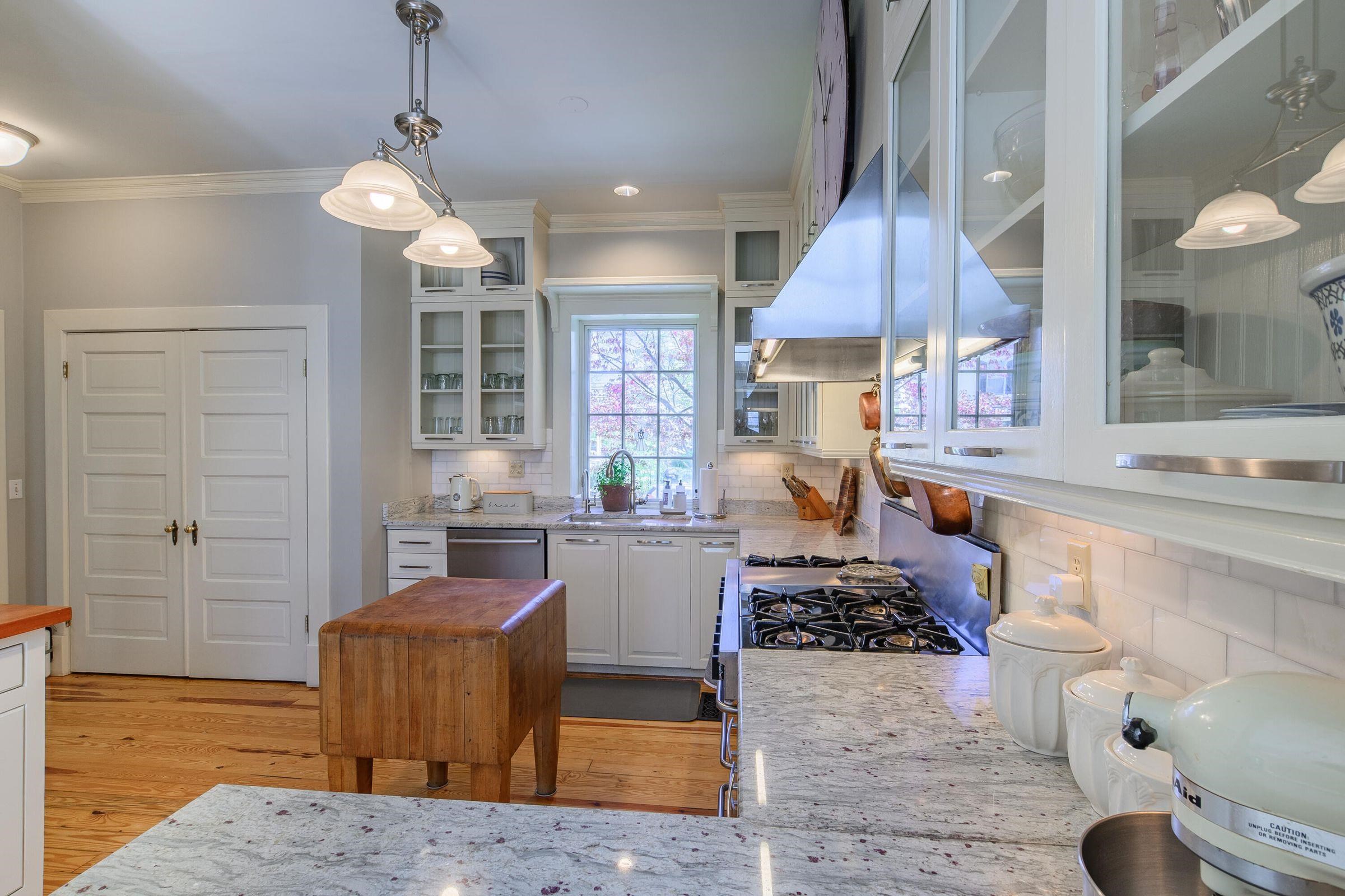 5-Star commercial stove with 8 burners and a griddle. Gourmet chef's kitchen!