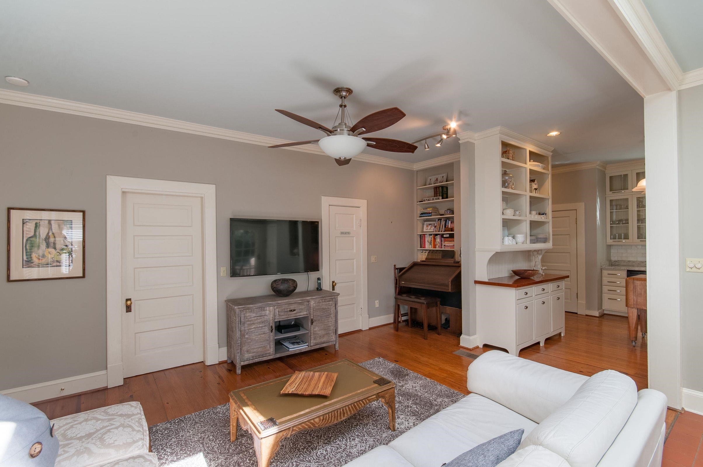 The kitchen opens into the light-filled family room.