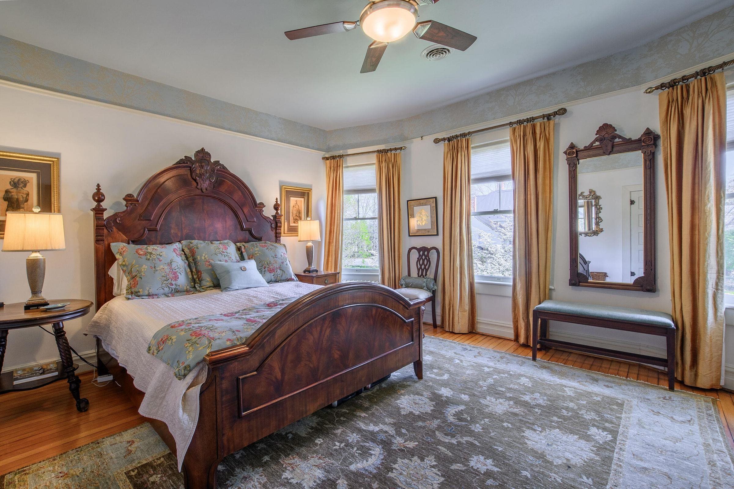 Second floor Master suite is spacious and full of light.