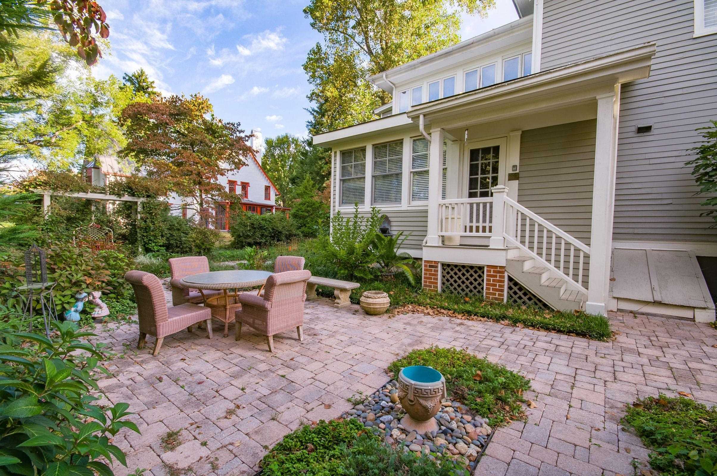 Picnic on the stone patio amidst delightful gardens.