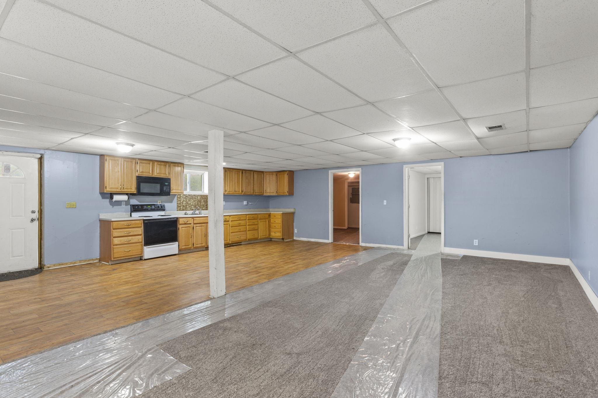 with access to bedroom and den/bedroom.