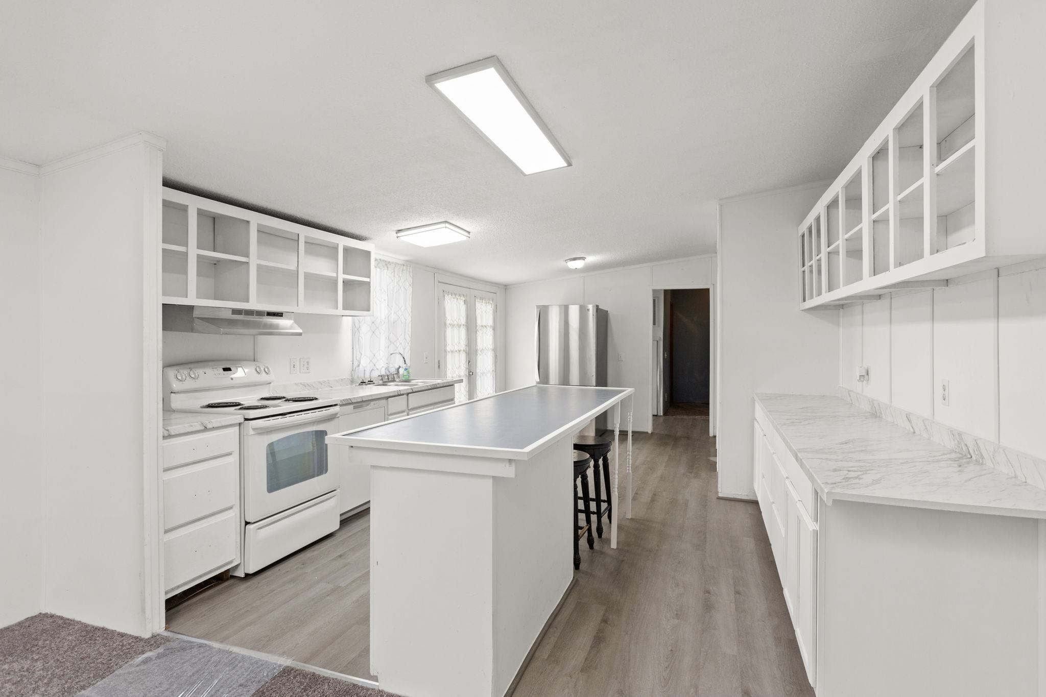 from the family room to eat-in area/laundry area.