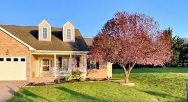 Wonderfully landscaped front, lovely morning sun.