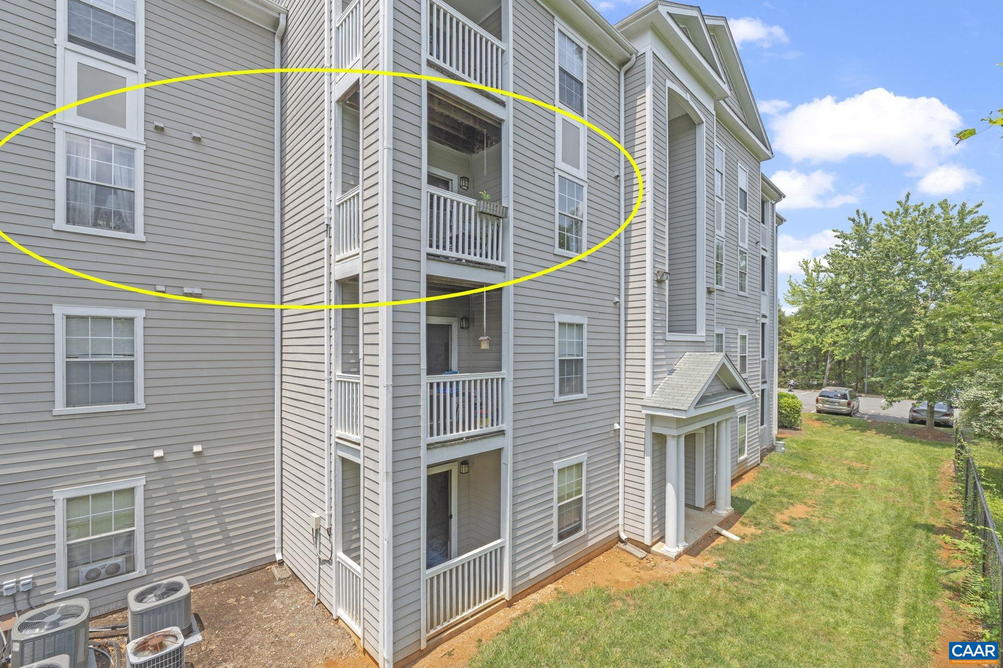 Located in a quiet spot in the neighborhood, this 2nd floor unit is on the backside of the building overlooking  the woods