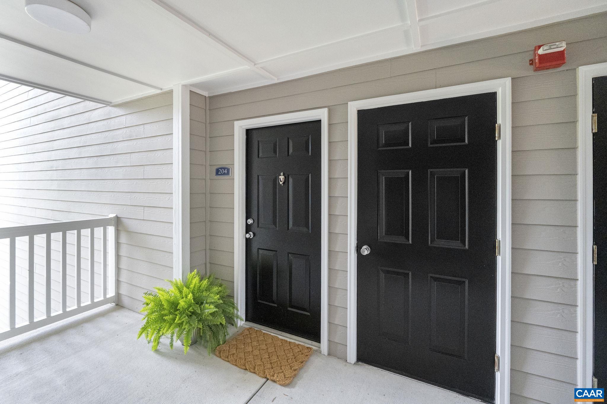 The keyed storage closet is conveniently located by the front entry