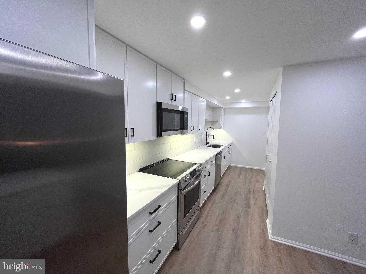 7720 TREMAYNE PL #107, MCLEAN, Virginia 22102, 2 Bedrooms Bedrooms, ,2 BathroomsBathrooms,Residential,For sale,7720 TREMAYNE PL #107,VAFX2249096 MLS # VAFX2249096