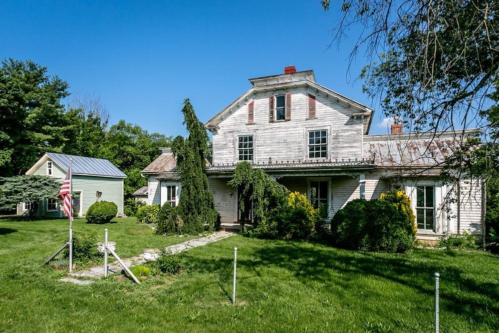 Large historical home with lots of charm and separate quest house!