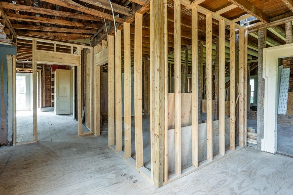standing in back sunroom/pantry space.