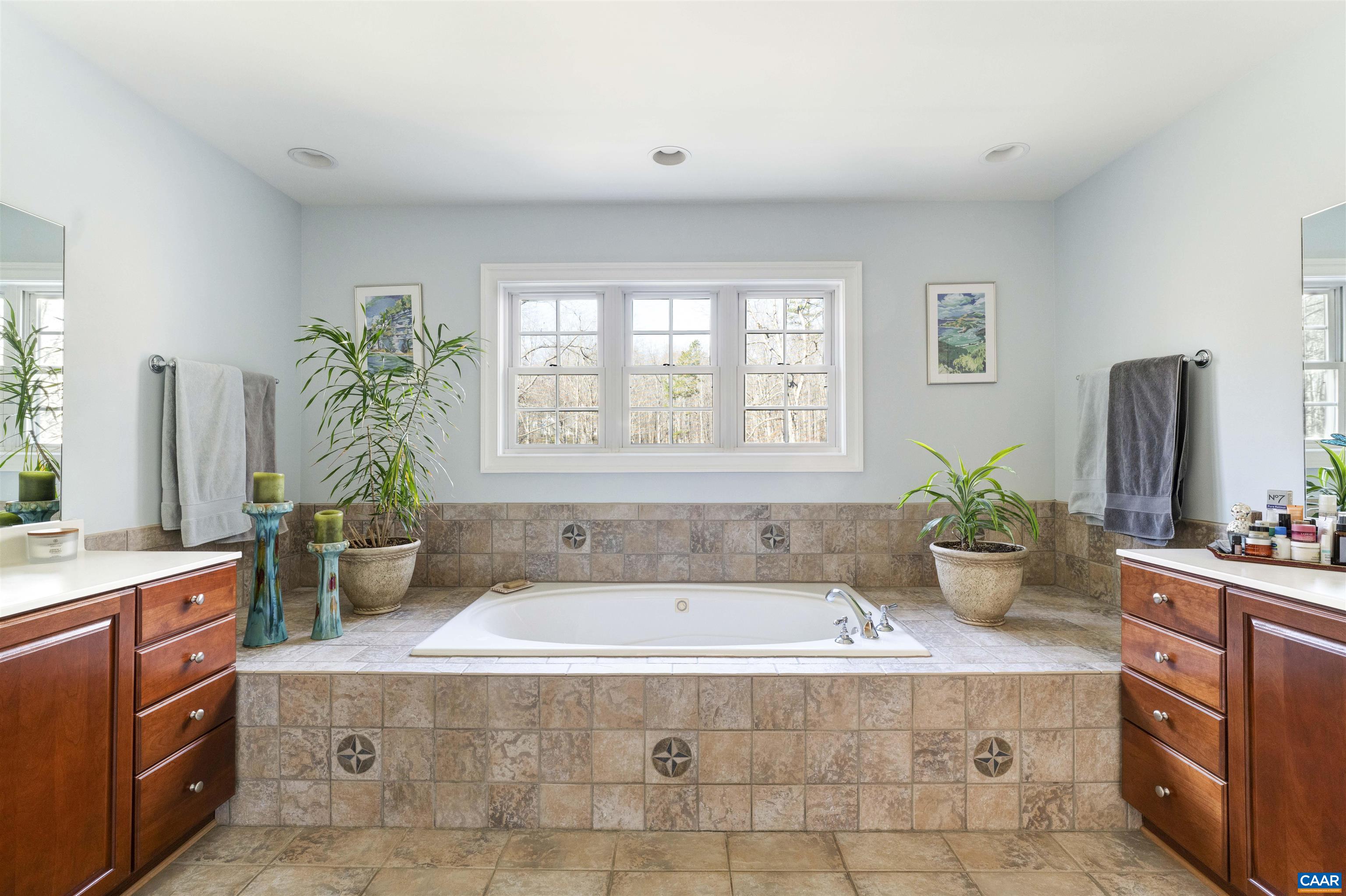 Master bath with his and her vanities
