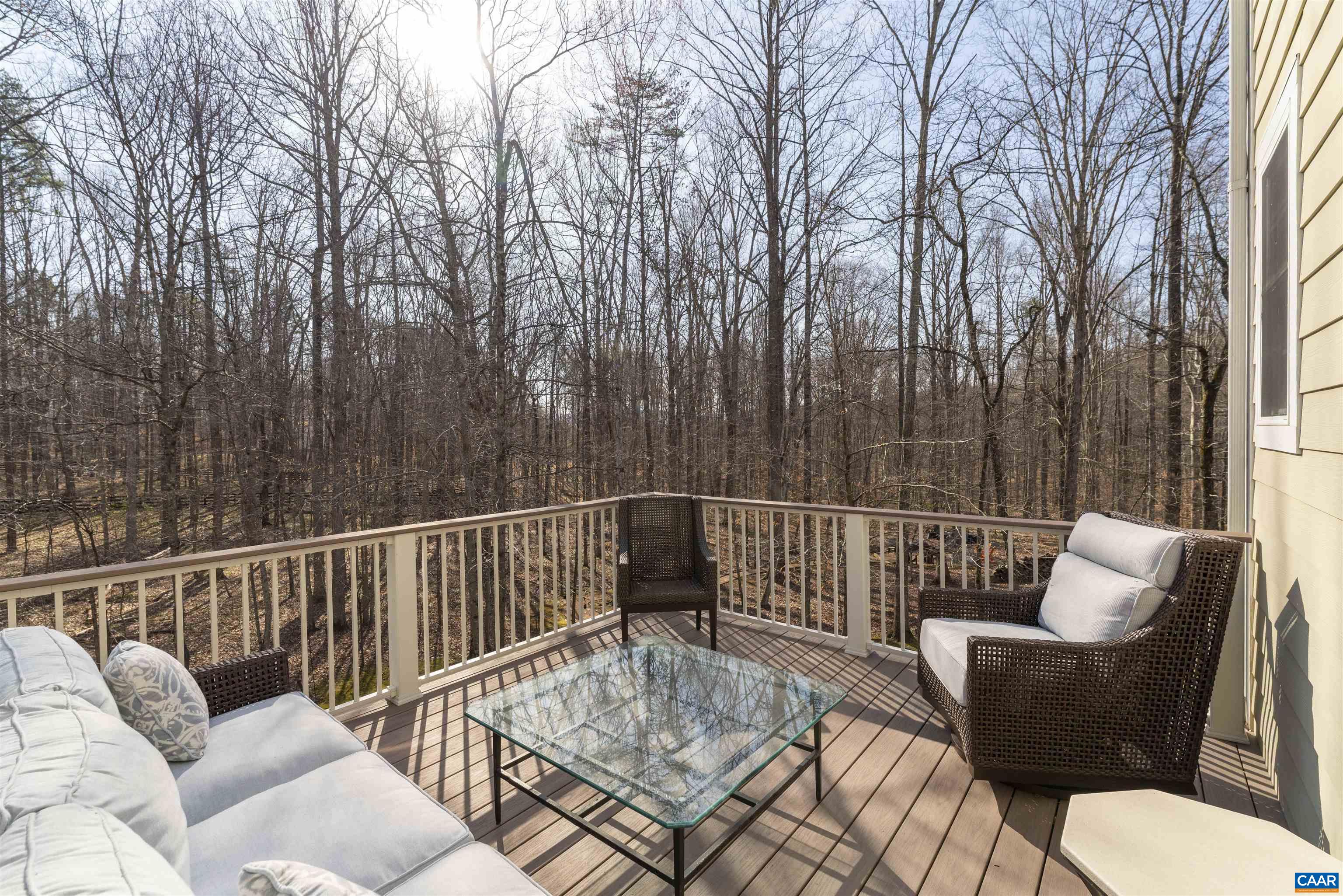 Made of composite material.  Over looking private wooded yard