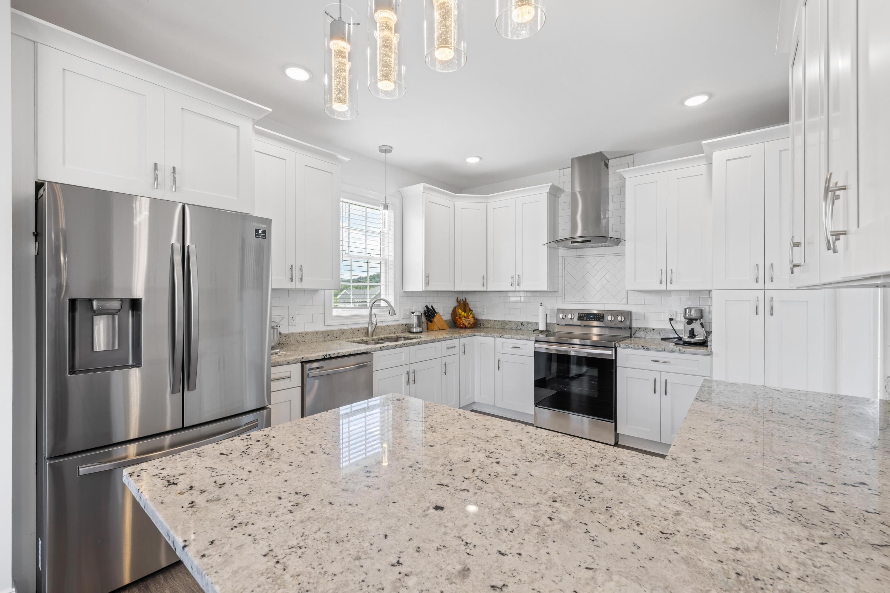 *granite countertops and white cabinets