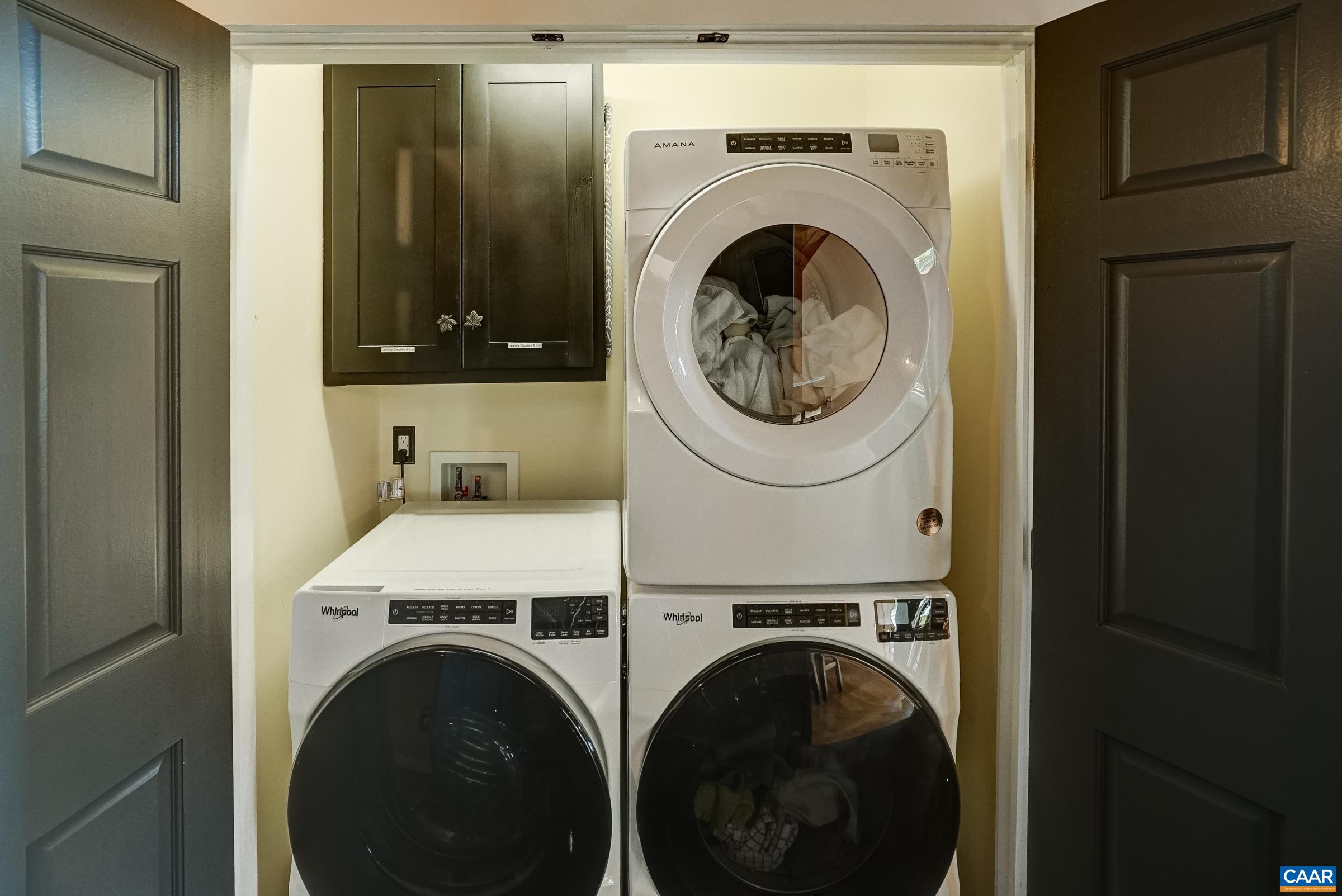 Main floor features laundry area with two dryers!