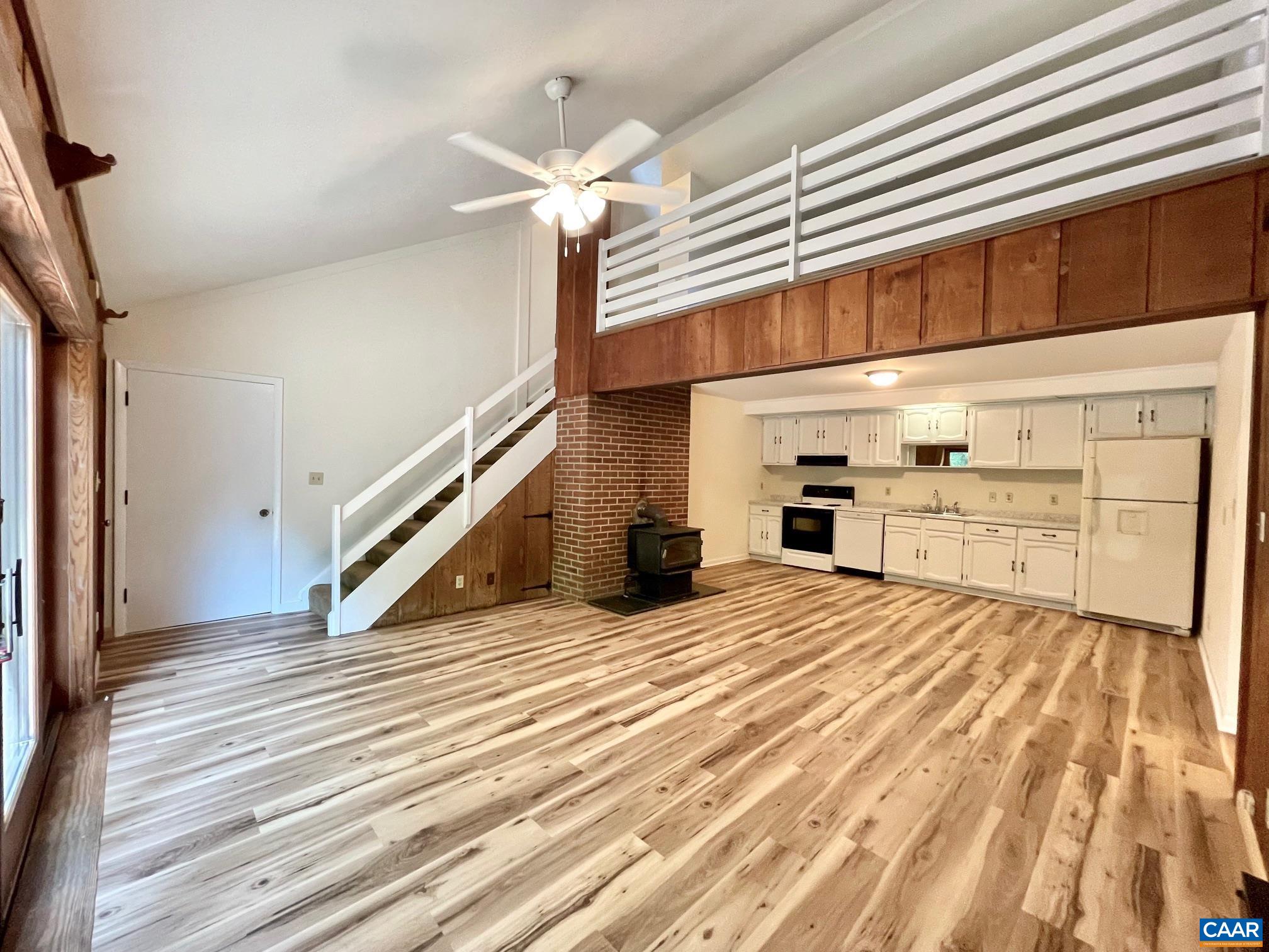 NEW flooring in living room and kitchen.