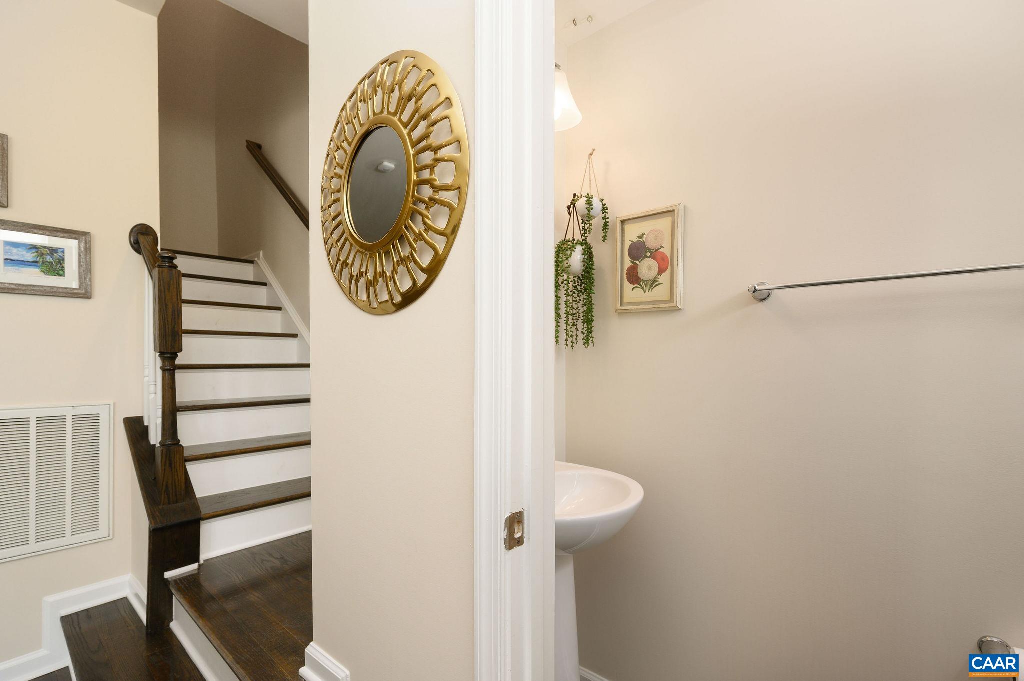 Second powder room on the kitchen level.