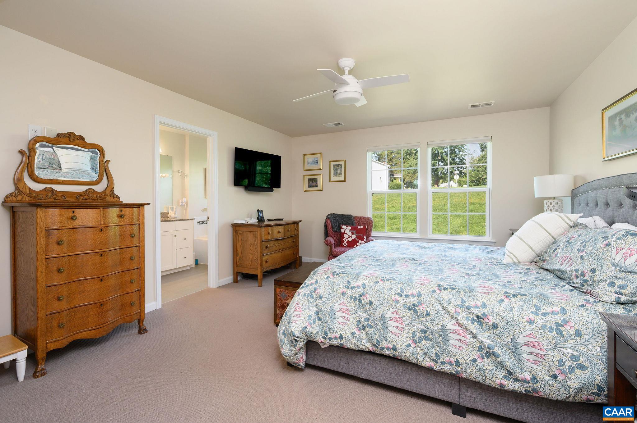 Large primary bedroom with new carpeting.....