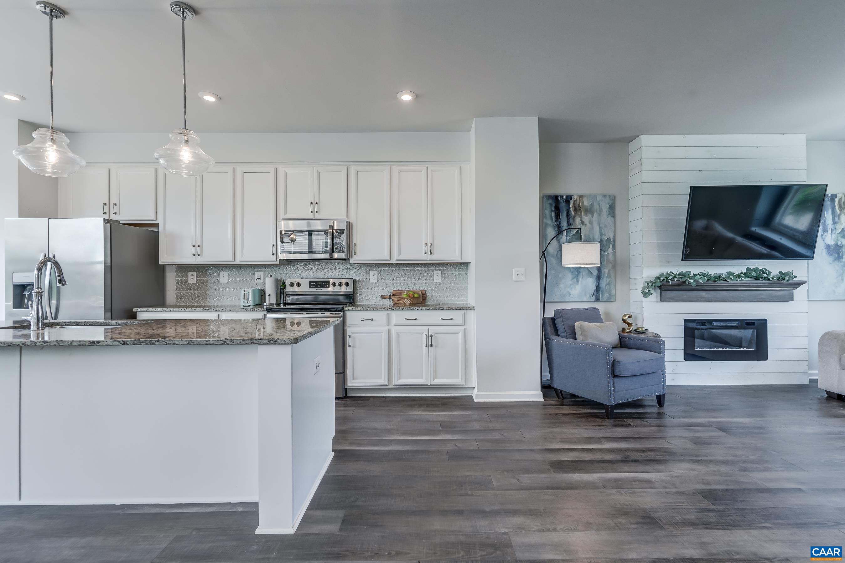 Open Floor plan on main level with large great room that opens to kitchen.