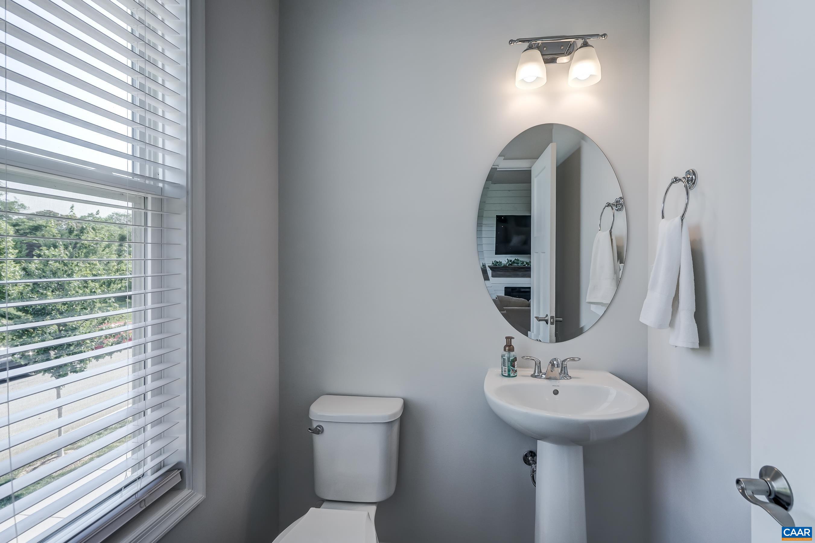 Powder room with pedestal sink.