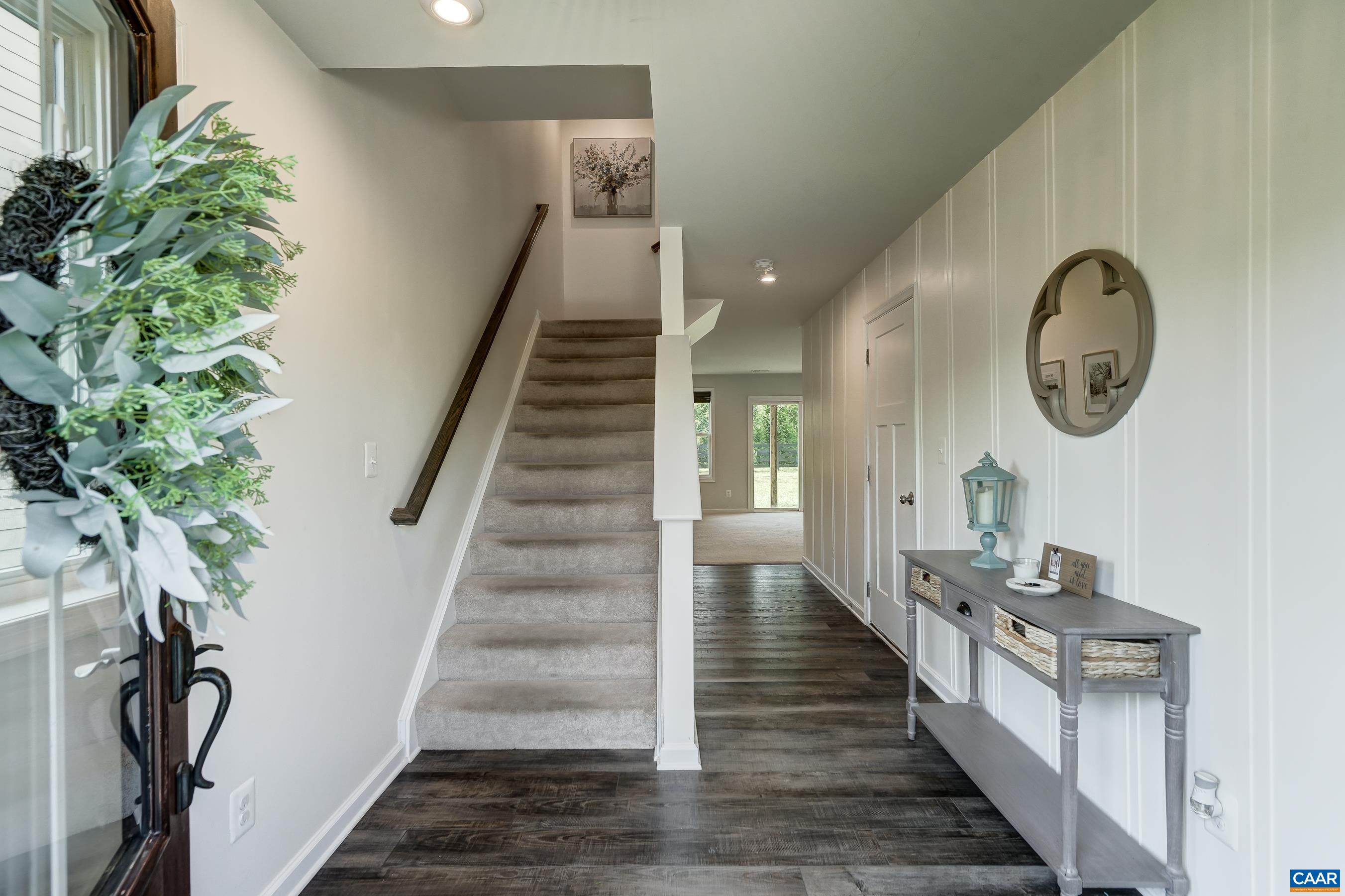 Engineered hardwood floors and neutral paint make this home bright and airy.
