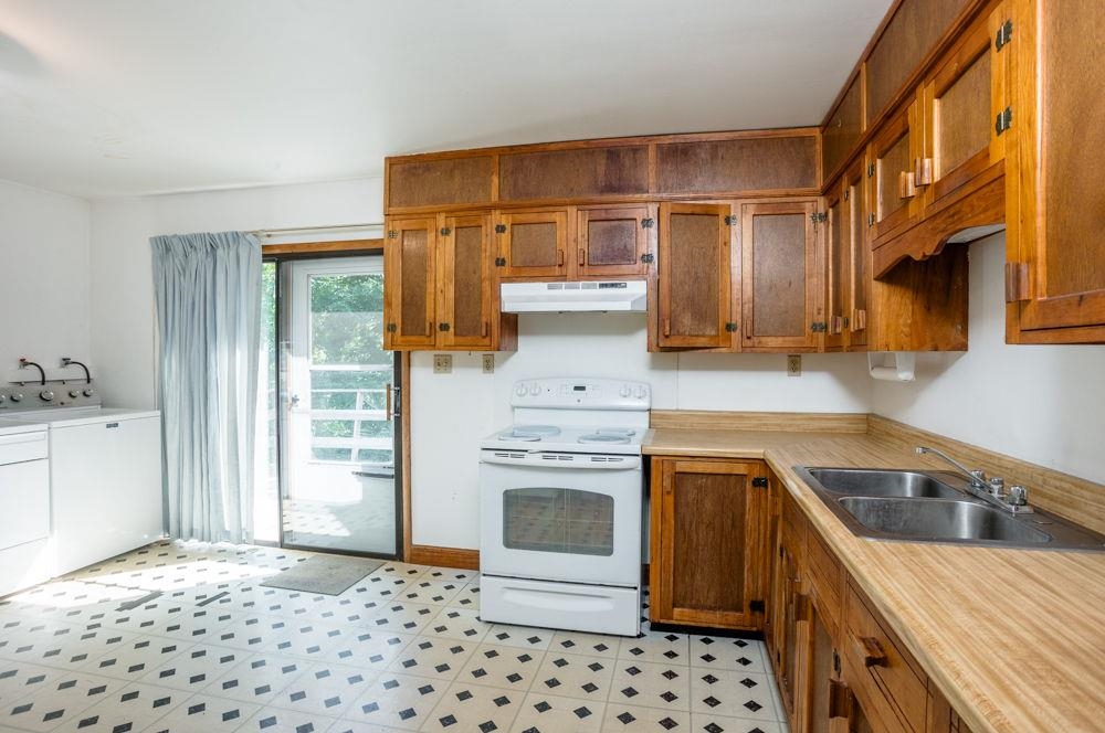 with laundry and eat-in area