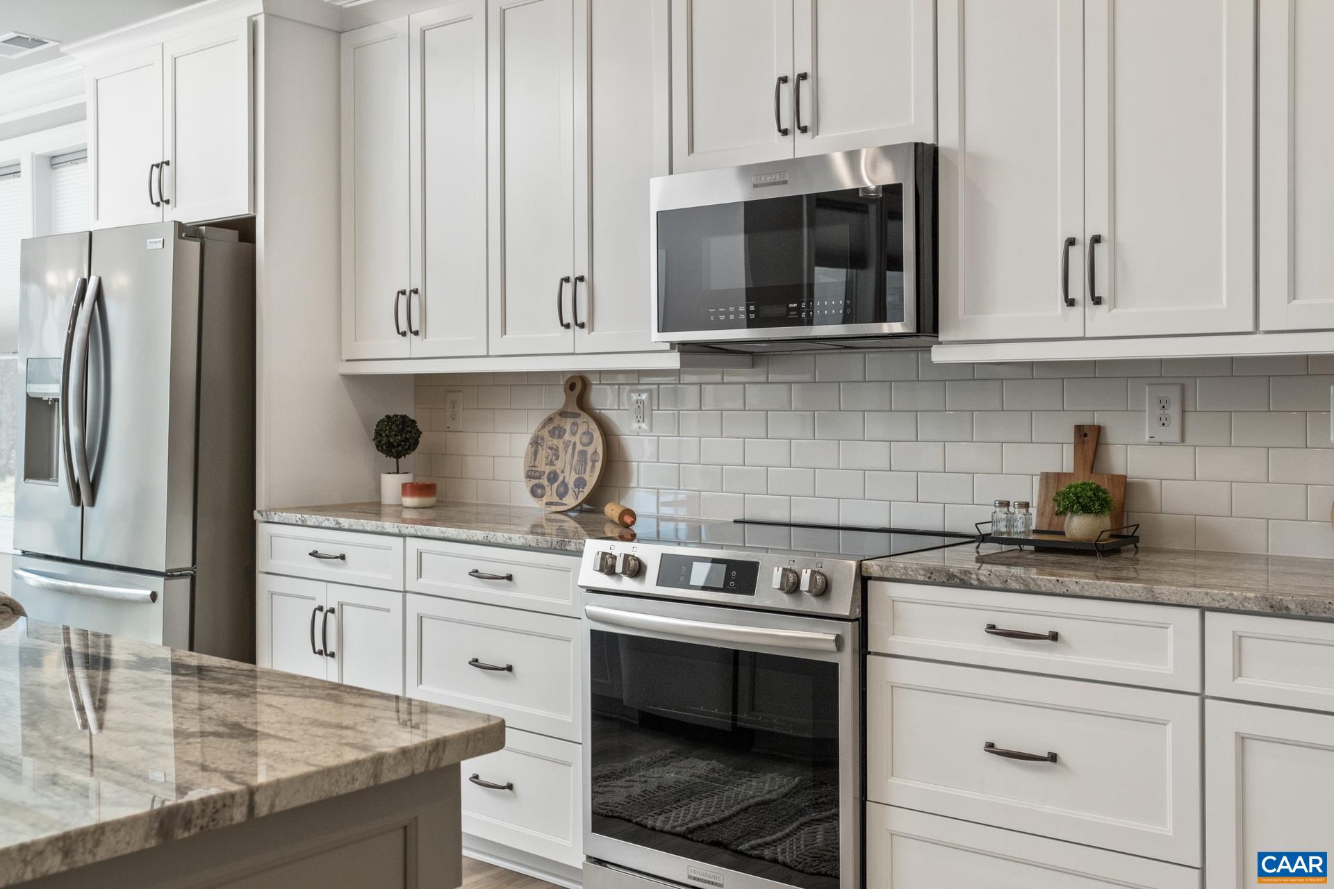 The stainless steel appliances are smudge proof, with an upgraded refrigerator.