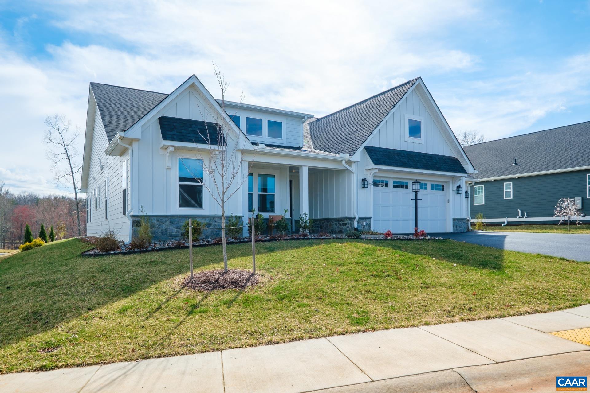 One-level living, better than new with many upgrades and special features.  Property features three full-sized garages.
